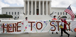 Beneficiaries of the Deferred Action for Childhood Arrivals program and their supporters celebrate outside the U.S. Supreme Court in Washington June 18, 2020, after the high court upheld DACA in a challenge brought by the Trump administration. Judge Andrew S. Hanen of the U.S. District Court for the Southern District of Texas in Houston ruled July 16, 2021, that DACA is unlawful, nine years after it was created by President Barack Obama by executive order. (CNS photo/Jonathan Ernst, Reuters)