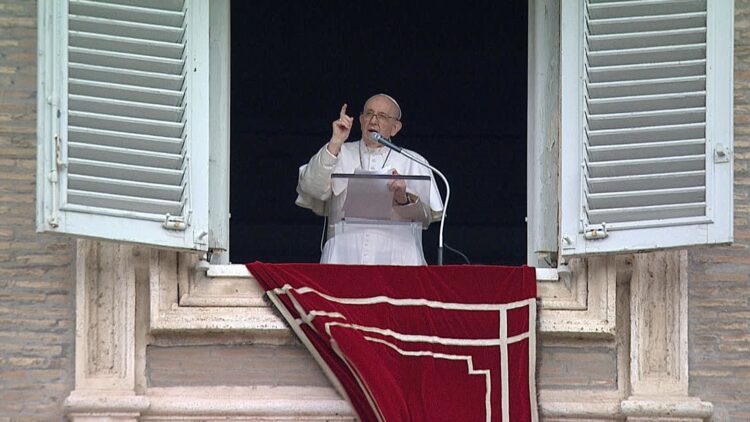 Pope Francis leads the Angelus from the window of his studio overlooking St. Peter's Square at the Vatican July 25, 2021. (CNS photo/Vatican Media)