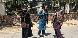 Taliban fighters stand with their weapons on a street in Kabul, Afghanistan, Aug. 16, 2021. During his Angelus address Aug. 15, Pope Francis expressed his concern for Afghanistan amid the Taliban's control of the country. (CNS photo/Reuters)