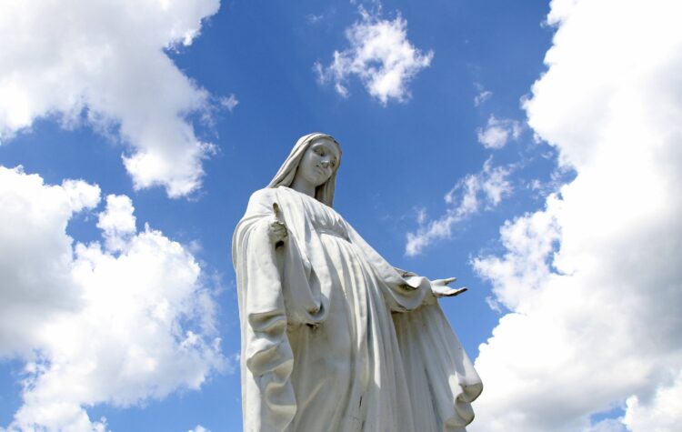 A statue of Mary overlooks the grounds of St. Jude Church in Mastic Beach, N.Y., Aug. 4, 2013. Mary's assumption into heaven reminds people that they, too, are called to the same "glorious destiny," Pope Francis said during his Angelus Aug. 15, 2021. (CNS photo/Gregory A. Shemitz)