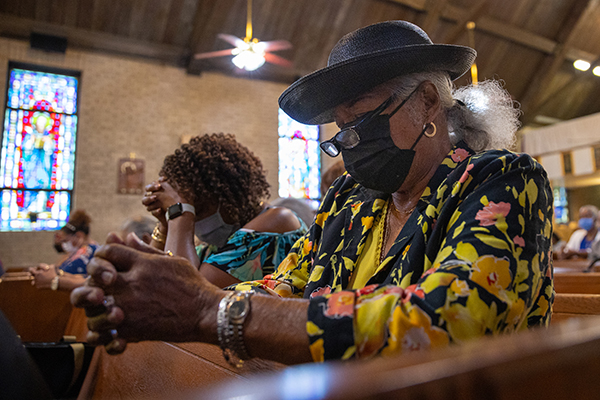 Dolly Stanton prays at Saint Bartholomew's in Camden, NJ on Sunday, September 19, 2021.