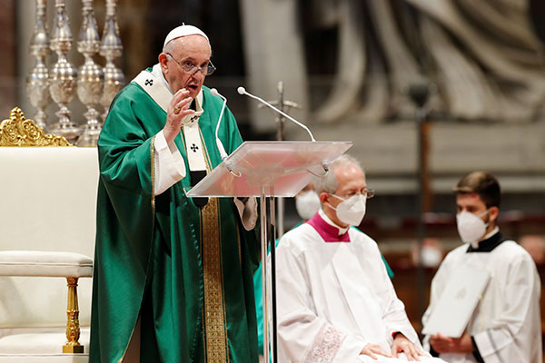 Pope Francis gives the homily as he celebrates a Mass to open the process that will lead up to the assembly of the world Synod of Bishops in 2023, in St. Peter's Basilica at the Vatican Oct. 10, 2021. (CNS photo/Remo Casilli, Reuters)