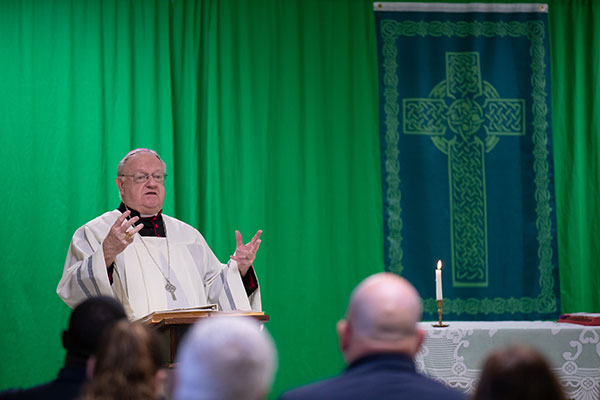 Bishop Dennis Sullivan speaks about the importance of never forgetting Bloody Sunday after Mass Jan. 30 at Fort Mercer Club, National Park. (Dave Hernandez photo)