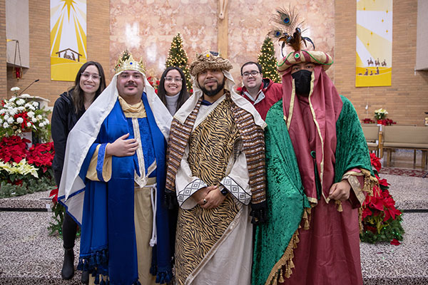 Front row Catholic Millennial Ministry members José Rodriguez, Joshua Benton and Brandon Sanchez dress like the Magi for the Solemnity of the Epiphany of the Lord Mass celebrated Jan. 2 at Divine Mercy Church, Vineland. Back row are Ashley Gonzalez, Star Martinez and Anthony Lopez.
