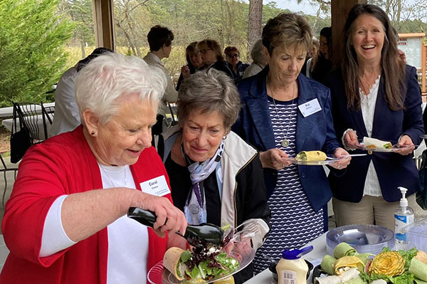 Parish nurses and care coordinators enjoy an outdoor lunch during the “Weathering the Storm” retreat in Mullica Township. (Photos by Gloria Sanders)