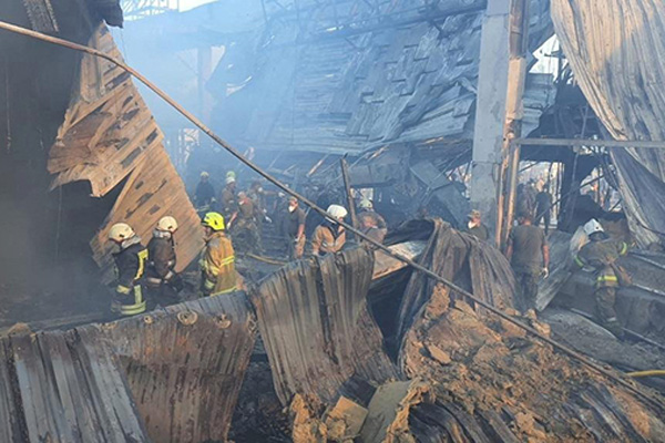Rescuers work at a site of a shopping mall hit by a Russian missile strike in Kremenchuk, Ukraine, June 27, 2022. The Russian attacks on the mall with about 1,000 civilians inside were the "largest terrorist attack in Europe in decades," said Archbishop Sviatoslav Shevchuk, major archbishop of the Ukrainian Catholic Church. (CNS photo/Press service of the State Emergency Service of Ukraine handout via Reuters) NO ARCHIVES. MUST DISCARD 30 DAYS AFTER DOWNLOAD.