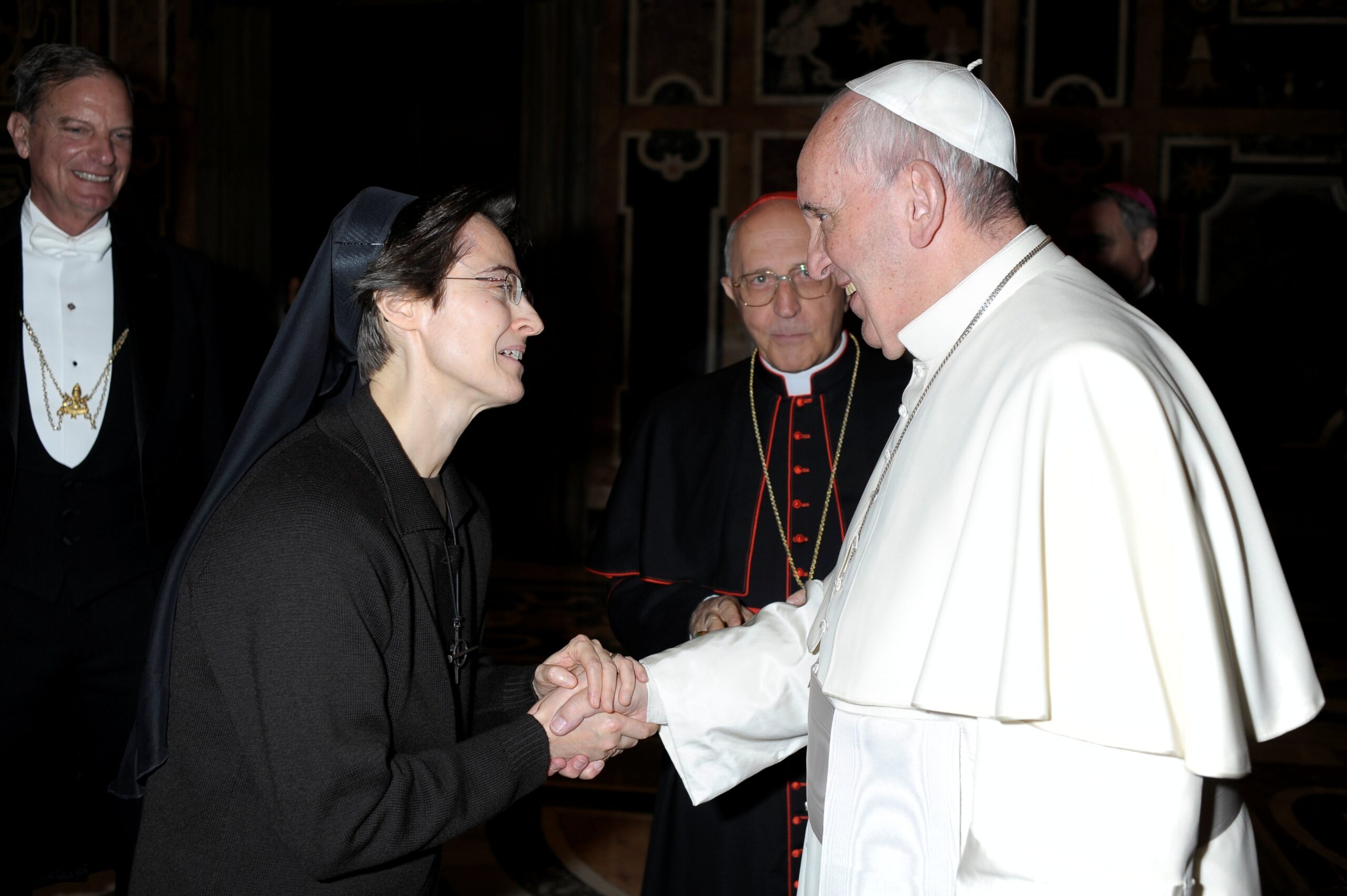 Pope Francis greets Sister Raffaella Petrini, an Italian member of the U.S.-based Franciscan Sisters of the Eucharist who is secretary-general of the office governing Vatican City State, at the Vatican Dec. 3, 2015. (CNS photo/Vatican Media via Reuters)