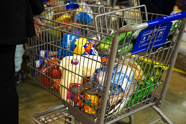 Groceries selected by a client Nov. 15 are pulled through the food pantry operated by the Indianapolis Council of the Society of St. Vincent de Paul in Indianapolis. Clients can choose from about 150 different food products based on a point system. (CNS photo/Katie Rutter) See FOOD-PANTRY-THANKSGIVING Nov. 20, 2018.
