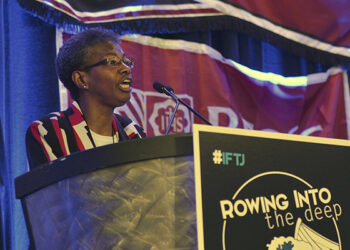 Sister Patricia Chappell, then executive director of Pax Christi USA, speaks Nov. 5, 2017, to a crowd of more than 2,000 young adults at the Ignatian Family Teach-in for Justice held in the Washington suburb of Arlington, Va. In a Jan. 28, 2023, keynote at the Catholic Social Ministry Gathering in Washington, Sister Chappell,  a Sister of Notre Dame deNamur who is a longtime educator and global peacemaker, addressed how to be a peacemaker in today's world. (OSV News photo/courtesy Ignatian Solidarity Network)