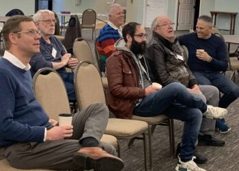 Photo by Peter G. Sánchez
Men of all ages gather in the lower level of Christ the King Church on a recent Wednesday morning for That Man is You! – which, one member says, “has made me a better man at home and at work.”
