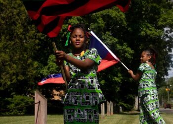 People in Flint, Mich., celebrate Juneteenth June 19, 2021. The national holiday commemorates the end of slavery in Texas, two years after the 1863 Emancipation Proclamation freed slaves elsewhere in the United States. (CNS photo/Emily Elconin, Reuters)
