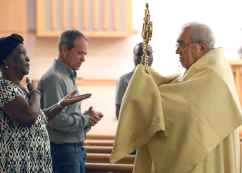 Msgr. Joseph Malagreca, pastor of Holy Cross Parish in Brooklyn, N.Y., leads trilingual Holy Hour at Our Lady of Perpetual Help in Galloway Township, Wednesday, Sept. 20, 2023. The service was held in English, Spanish and Creole. (Lori M. Nichols)