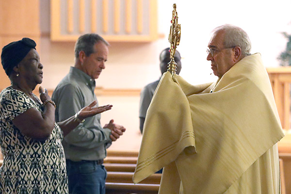 Msgr. Joseph Malagreca, pastor of Holy Cross Parish in Brooklyn, N.Y., leads trilingual Holy Hour at Our Lady of Perpetual Help in Galloway Township, Wednesday, Sept. 20, 2023. The service was held in English, Spanish and Creole. (Lori M. Nichols)