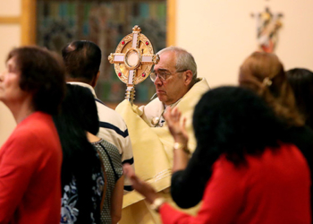 Msgr. Joseph Malagreca, pastor of Holy Cross Parish in Brooklyn, N.Y., leads trilingual Holy Hour at Our Lady of Perpetual Help in Galloway Township, Wednesday, Sept. 20, 2023. The service was held in English, Spanish and Creole. (Lori M. Nichols)