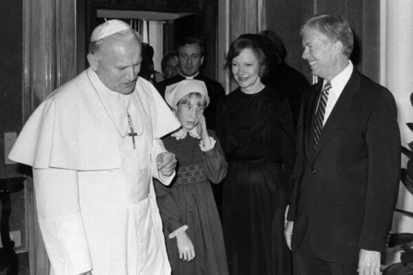 St. John Paul II meets with then-President Jimmy Carter, his wife, Rosalynn, and daughter, Amy, at the Vatican in June of 1980. First lady Rosalynn Carter died Nov. 19, 2023, at age 96. She was her husband's closest adviser to Jimmy Carter during his one term as U.S. president and their four decades thereafter as global humanitarians. (OSV News photo/Arturo Mari)