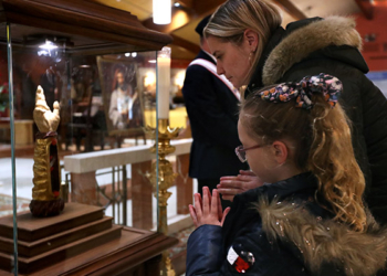 People view bone fragments believed to be from the arm of Saint Jude at Saint Gianna Beretta Molla Parish in Northfield, Thursday, Feb. 1, 2024.