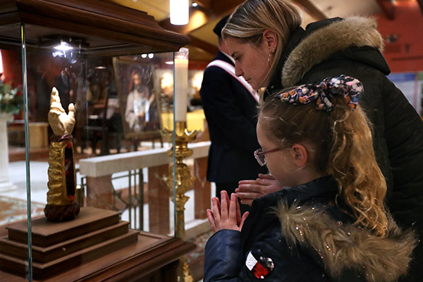 People view bone fragments believed to be from the arm of Saint Jude at Saint Gianna Beretta Molla Parish in Northfield, Thursday, Feb. 1, 2024.