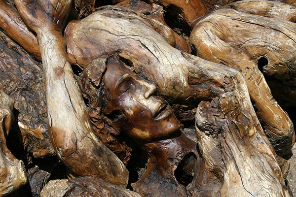 A wooden sculpture suggesting the souls in purgatory is featured in this undated file photo. (OSV News photo/Ron Porter, Pixabay)