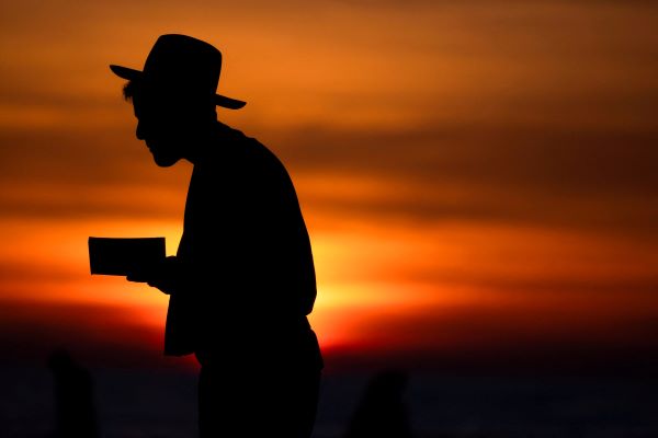 A man prays during sunset, amid the ongoing conflict between Israel and the Palestinian group Hamas, in Ashkelon, Israel, Jan. 8, 2024. (OSV News photo/Amir Cohen, Reuters)