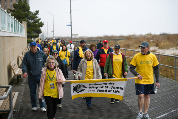 Mimi Schaible, director of Care Coordination and Consultation for VITALity Catholic Healthcare Services of the Diocese of Camden, and Deacon Joseph Janocha, VITALity’s director of hospital chaplaincy, lead pilgrims on the “Way of Saint James” walk April 20 in Ventnor.