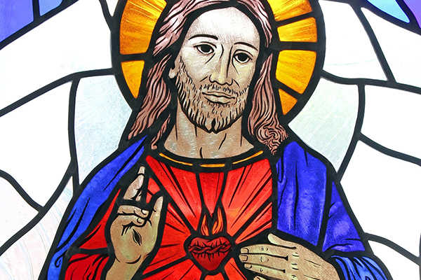 The Sacred Heart of Jesus is depicted in a stained-glass window at St. Patrick Church in Smithtown, N.Y. (OSV News photo/CNS file, Gregory A. Shemitz)