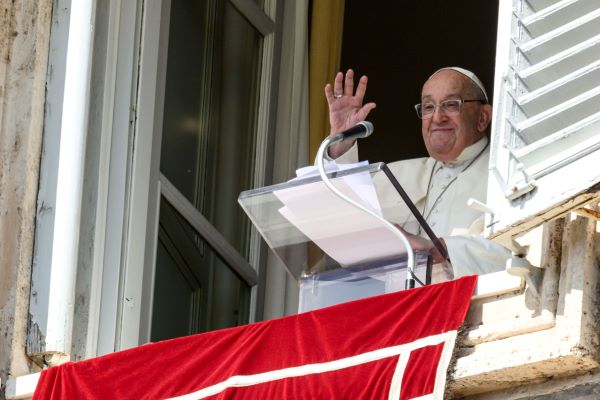 Pope Francis waves to visitors gathered in St. Peter's Square at the Vatican Oct. 6, 2024, for the midday recitation of the Angelus. At the end of the Angelus, the pope announced he would create 21 new cardinals Dec. 8. (CNS photo/Vatican Media)