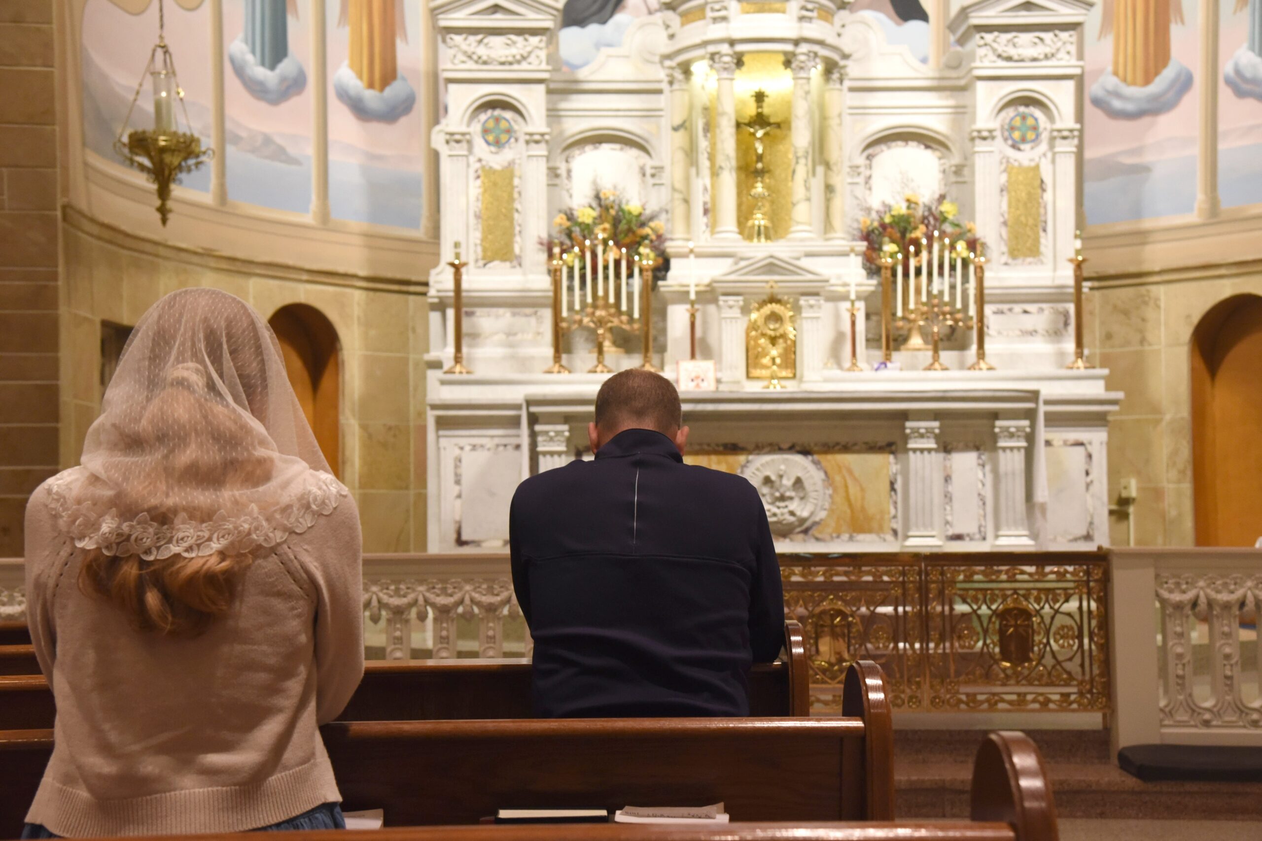 People pray in adoration of the Blessed Sacrament on Nov. 5, 2024, Election Day, at Our Lady of the Most Holy Rosary Church in Indianapolis. The parish  had eucharistic adoration available on Election Day while polls were open in Indiana, from 6 a.m.-6 p.m. (OSV News photo/Sean Gallagher, The Criterion)