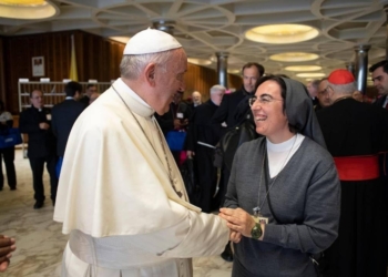 Pope Francis names Salesian Sister Alessandra Smerilli as secretary of the Dicastery for Promoting Integral Human Development. Sister Smerilli is pictured meeting the pope at the Vatican in an undated photo. Pope Francis, formerly Argentine Cardinal Jorge Mario Bergoglio, died April 21, 2025, at age 88.  (CNS photo/Vatican Media, courtesy Dicastery for Promoting Integral Human Development)