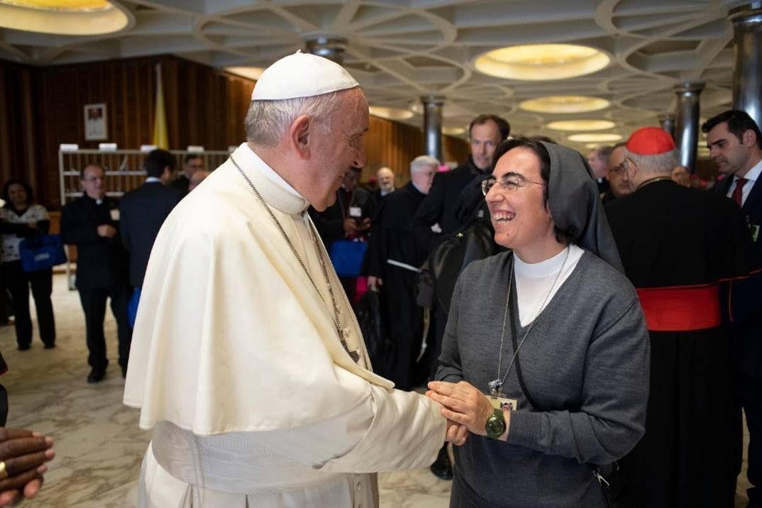 Pope Francis names Salesian Sister Alessandra Smerilli as secretary of the Dicastery for Promoting Integral Human Development. Sister Smerilli is pictured meeting the pope at the Vatican in an undated photo. Pope Francis, formerly Argentine Cardinal Jorge Mario Bergoglio, died April 21, 2025, at age 88.  (CNS photo/Vatican Media, courtesy Dicastery for Promoting Integral Human Development)