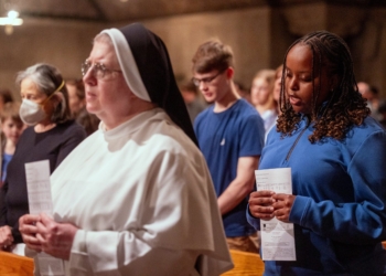 People attend a Memorial Mass for Pope Francis on April 21, 2025, at the Crypt Church of the Basilica of the National Shrine of the Immaculate Conception in Washington The pontiff died earlier that morning in Rome at the age of 88. (OSV News photo/Mihoko Owada, Catholic Standard )