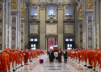 Cardinals line the isle as pallbearers carry the casket of Pope Francis into St. Peter's Basilica at the conclusion of his funeral Mass in St. Peter's Square at the Vatican April 26, 2025. (OSV News photo/Vatican Media)
