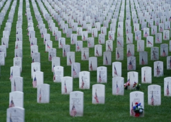 Gravestones adorned with American Flags are seen at Arlington National Cemetery on Memorial Day in Arlington, Via., May 27, 2024. Each year on Memorial Day, celebrated on the last Monday of May, the nation pays tribute to U.S. military service members who have died in war. (OSV News photo/Nathan Howard, Reuters)