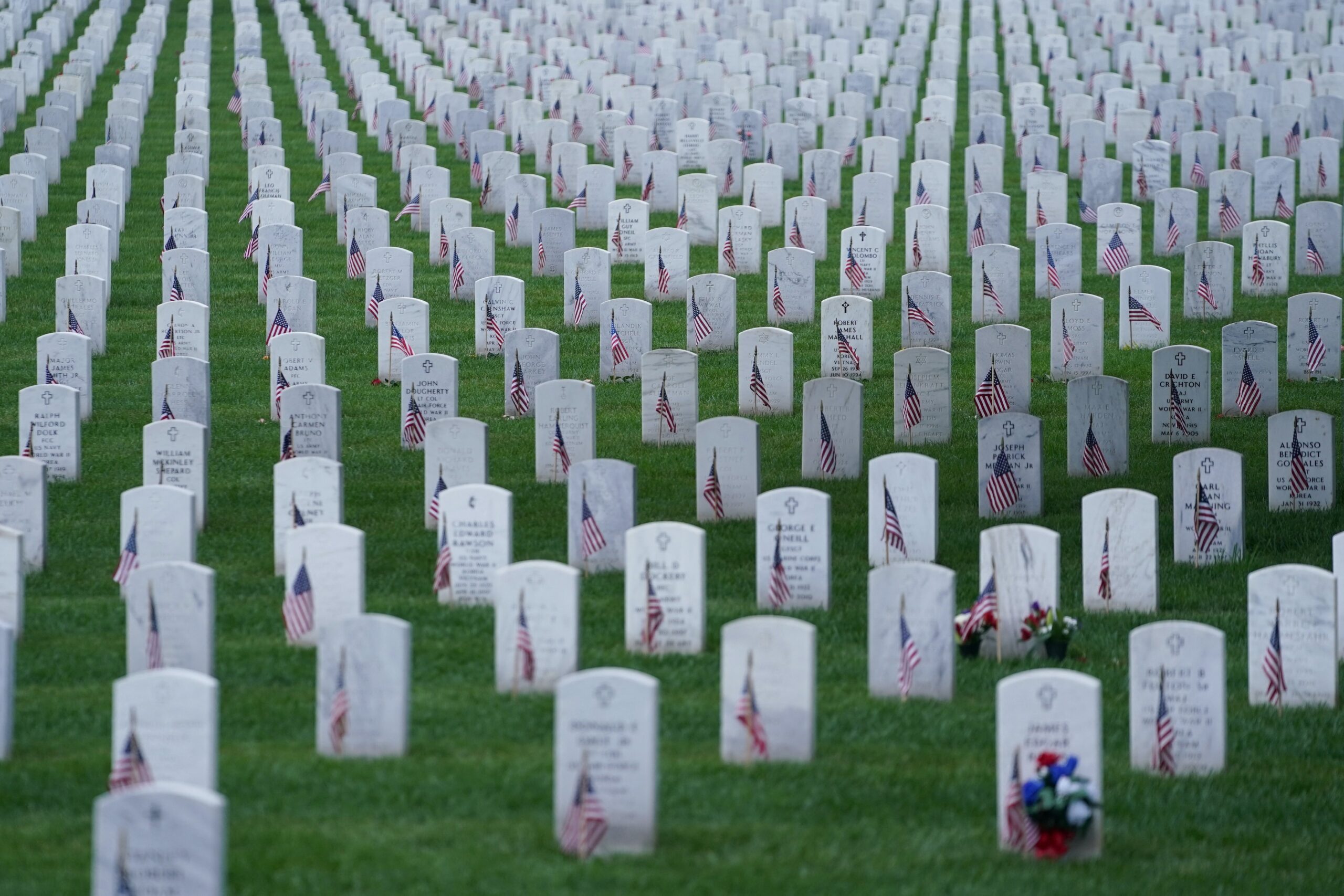Gravestones adorned with American Flags are seen at Arlington National Cemetery on Memorial Day in Arlington, Via., May 27, 2024. Each year on Memorial Day, celebrated on the last Monday of May, the nation pays tribute to U.S. military service members who have died in war. (OSV News photo/Nathan Howard, Reuters)