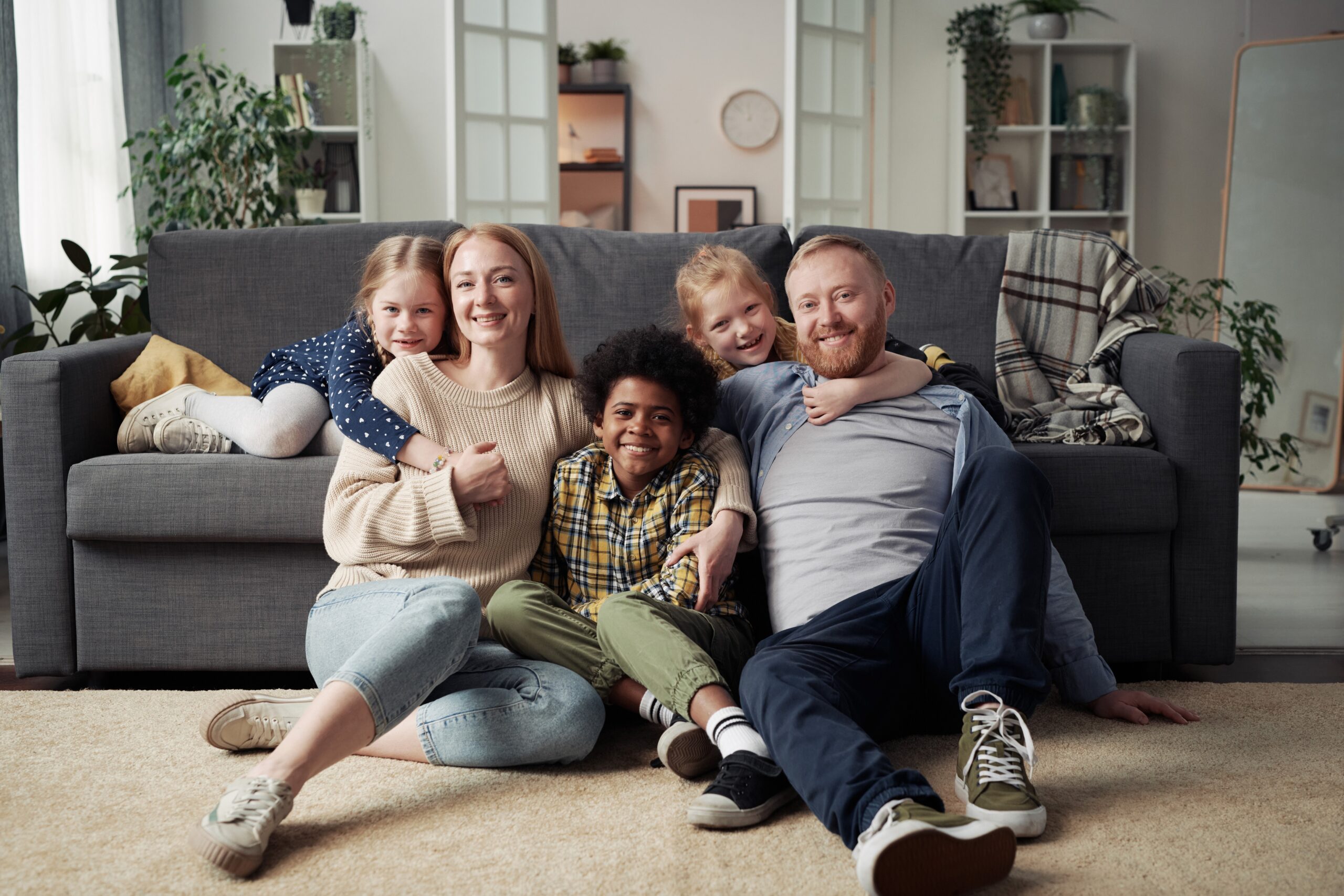 An advertisement for Catholic Charities Community Services depicts a foster care family. (OSV News photo/Catholic Charities Community Service)
