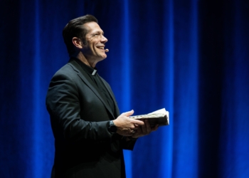 Father Mike Schmitz, a priest of the Diocese of Duluth, Minn., and host of the Bible in a Year podcast, speaks to the crowd during his 2025 Parables Tour. Father Mike took the tour to Constitution Hall in the nation’s capital May 19, 2025. (OSV News photo/courtesy Ascension)