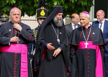 Metropolitan Archbishop Fulop Kocsis of Hajdudorog, Hungary, center, speaks with then-Archbishop Robert Francis Prevost, prefect of the Dicastery for Bishops, as they await the arrival of Pope Francis at the Buda Castle in Budapest April 28, 2023, during his apostolic visit to Hungary. Archbishop Michael Wallace Banach, apostolic nuncio to Hungary, stands to the left. Cardinal Prevost became Pope Leo XIV when he was elected as the first American pontiff in history at the Vatican May 8, 2025. (OSV News photo/Attila Lambert, courtesy of Magyar Kurir)