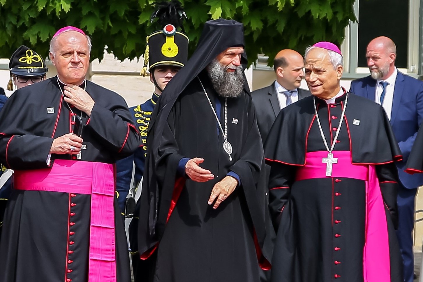 Metropolitan Archbishop Fulop Kocsis of Hajdudorog, Hungary, center, speaks with then-Archbishop Robert Francis Prevost, prefect of the Dicastery for Bishops, as they await the arrival of Pope Francis at the Buda Castle in Budapest April 28, 2023, during his apostolic visit to Hungary. Archbishop Michael Wallace Banach, apostolic nuncio to Hungary, stands to the left. Cardinal Prevost became Pope Leo XIV when he was elected as the first American pontiff in history at the Vatican May 8, 2025. (OSV News photo/Attila Lambert, courtesy of Magyar Kurir)
