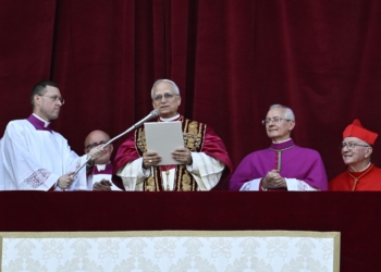 Pope Leo XIV, the former Cardinal Robert F. Prevost, waves to the crowds in St. Peter's Square at the Vatican after his election as pope May 8, 2025. The new pope was born in Chicago. (CNS photo/Vatican Media)
