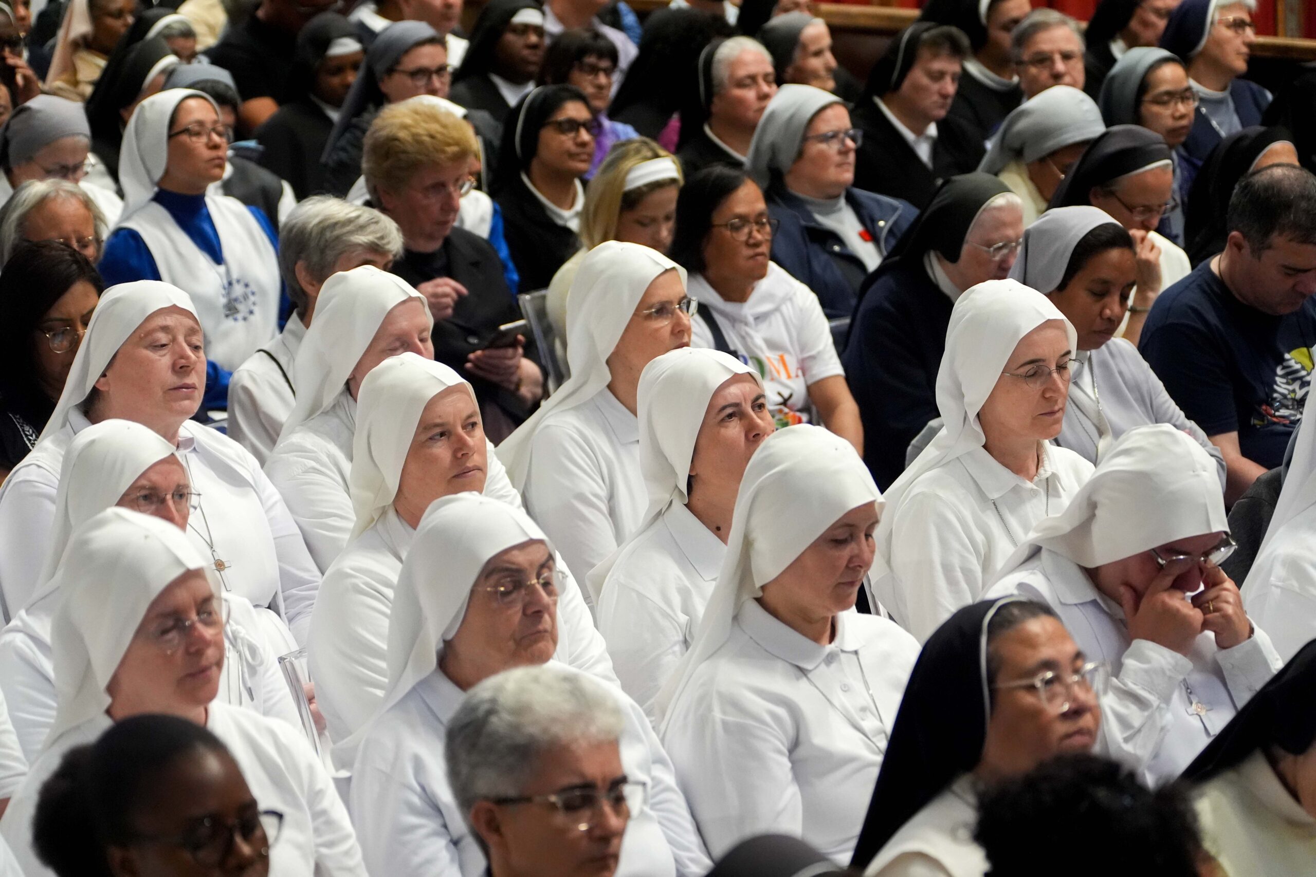 Religious sisters gather for the Mass celebrated by Cardinal Ángel Fernández Artime, pro-prefect of the Dicastery for Institutes of Consecrated Life and Societies of Apostolic Life under Pope Francis, on the eighth day of the “novendiali,” nine days of mourning for Pope Francis, at the Altar of the Confession in St. Peter’s Basilica at the Vatican May 3, 2025. (CNS photo/Lola Gomez)