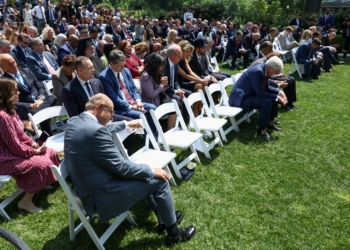 People bow their heads during the National Day of Prayer, in the Rose Garden at the White House in Washington, May 1, 2025. (OSV News photo/Evelyn Hockstein, Reuters)