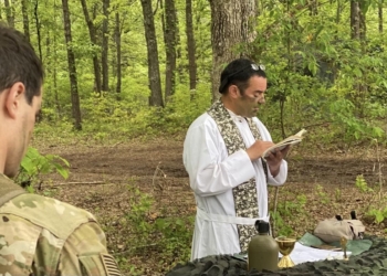 Father Peter Pomposello celebrates a field mass for soldiers  of the 101st Airborne Division at Fort Campbell, Ky., the summer of 2022. Father  Pomposello, a graduate of St. Joseph's Seminary in Yonkers, N.Y., who holds the rank of major and has been a chaplain since 2014, said his recruiting efforts have been "an eye-opener of how difficult it was to get a priest into the Army." (OSV News photo/courtesy Father Pomposello)