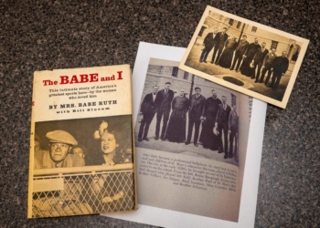 A photo taken May 6, 2025, shows a print of Babe Ruth visiting St. Mary’s Industrial School in Southwest Baltimore was sent to Archbishop William E. Lori for the archdiocesan archives. It was discovered by Ginny Black, a resident of Mount Pleasant, South Carolina, while she was searching through her late mother’s possessions. That same image is featured in a book titled "The Babe and I." (OSV News photo/Kevin J. Parks, Catholic Review)