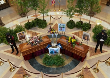 The caskets of senior Democratic state assemblywoman Melissa Hortman and her husband, Mark, lie in state June 27, 2025, at the Minnesota Capitol in St. Paul. The couple was shot dead in their home in a Minneapolis suburb June 14. A funeral Mass for them was celebrated June 28 at the Basilica of St. Mary in Minneapolis. (OSV News photo/Tim Evans, Reuters)