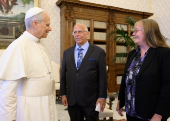 Pope Leo XIV speaks with his brother Louis Prevost and sister-in-law Deborah Prevost in the papal library of the Apostolic Palace at the Vatican May 19, 2025, after the pope's private meeting with U.S. Vice President JD Vance. (CNS photo/Vatican Media)