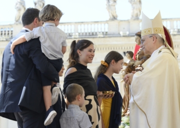 A family presents the offertory gifts to Pope Leo XIV during Mass marking the Jubilee of Families, Children, Grandparents and the Elderly in St. Peter’s Square at the Vatican June 1, 2025. (CNS photo/Vatican Media)