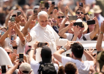 Pope Leo XIV greets people as he rides in the popemobile in St. Peter’s Square after celebrating Mass for the conclusion of the Jubilee of Sport in St. Peter’s Basilica at the Vatican June 15, 2025. (CNS photo/Lola Gomez)