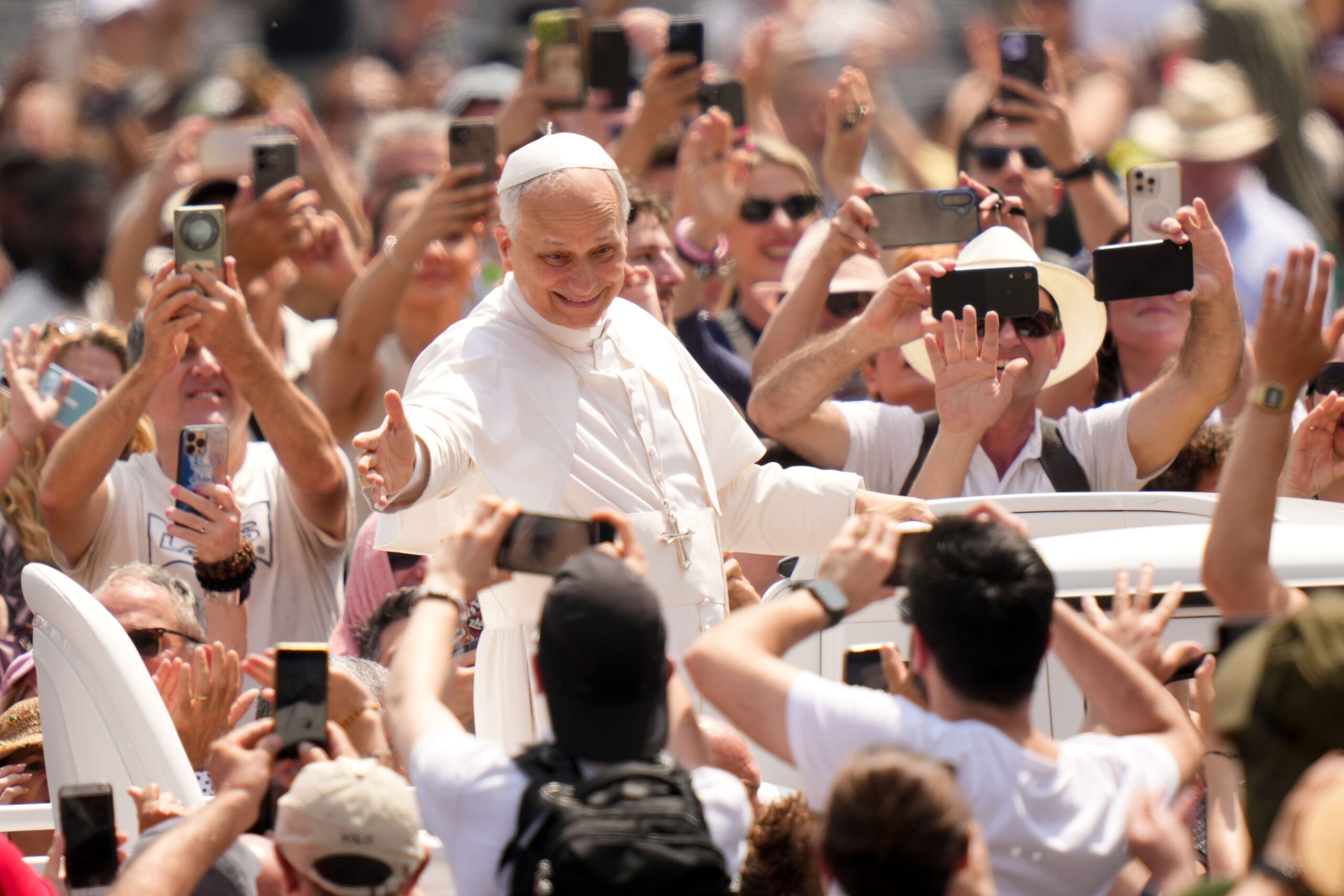 Pope Leo XIV greets people as he rides in the popemobile in St. Peter’s Square after celebrating Mass for the conclusion of the Jubilee of Sport in St. Peter’s Basilica at the Vatican June 15, 2025. (CNS photo/Lola Gomez)
