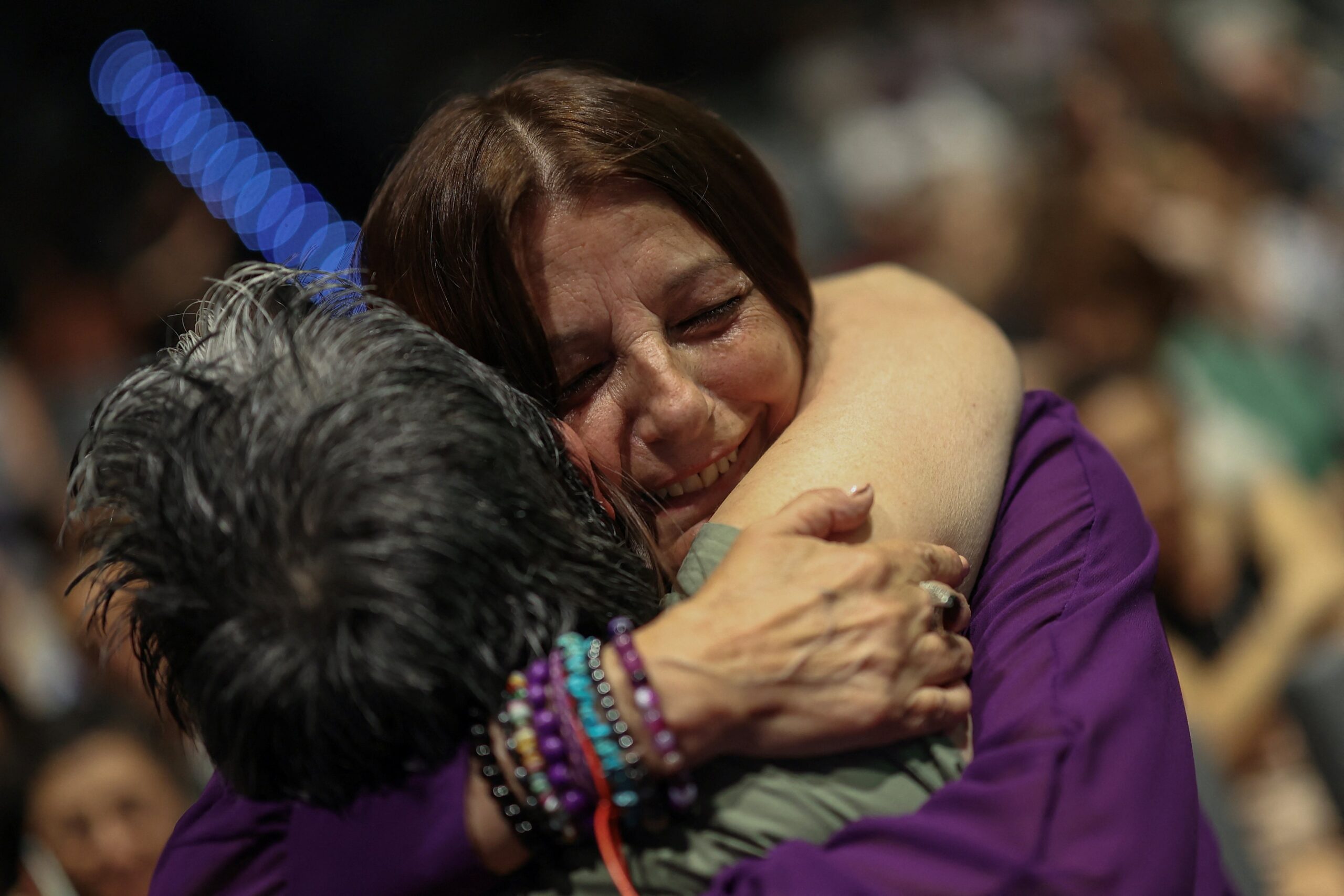 Consuelo Garcia del Cid, 66, a survivor and advocate for the cause, hugs an assistant before a ceremony in Madrid June 9, 2025, by the Spanish Confederation of Religious Entities (CONFER) to apologize to the survivors of Catholic moral rehabilitation institutes in Spain, where thousands of women and girls suffered harsh treatment during Francisco Franco's dictatorship. (OSV News photo/Juan Medina, Reuters)