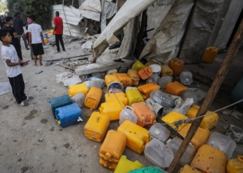 A boy looks at the site of an Israeli airstrike in Nuseirat in the central Gaza Strip July 13, 2025, that killed Palestinians gathering to collect water from a distribution point, according to medics. (OSV News photo/Reuters)