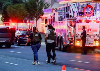 FBI agents investigate near a New York City Fire Department response vehicle during a reported active shooter situation in the Manhattan borough of New York City July 28, 2025. The shooting at a midtown Manhattan office building left at least three people dead, including an off-duty New York City police officer, sources told the The Associated Press. (OSV News Photo/Bing Guan, Reuters)
